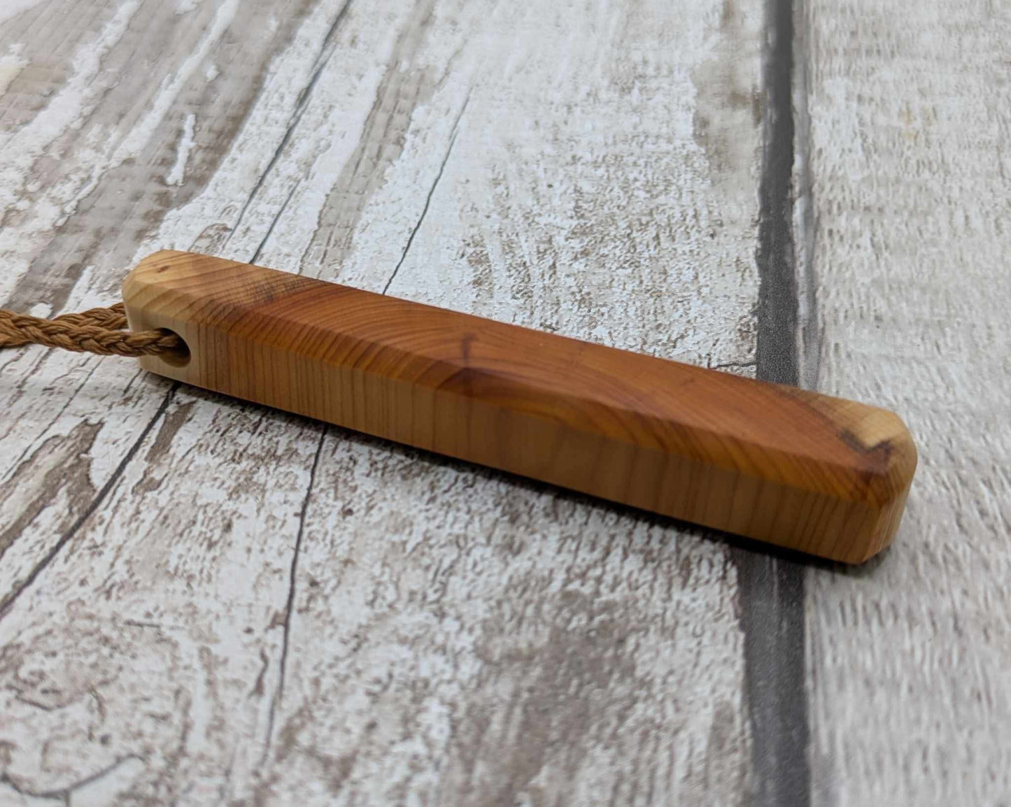 Yew wood roimata pendant.