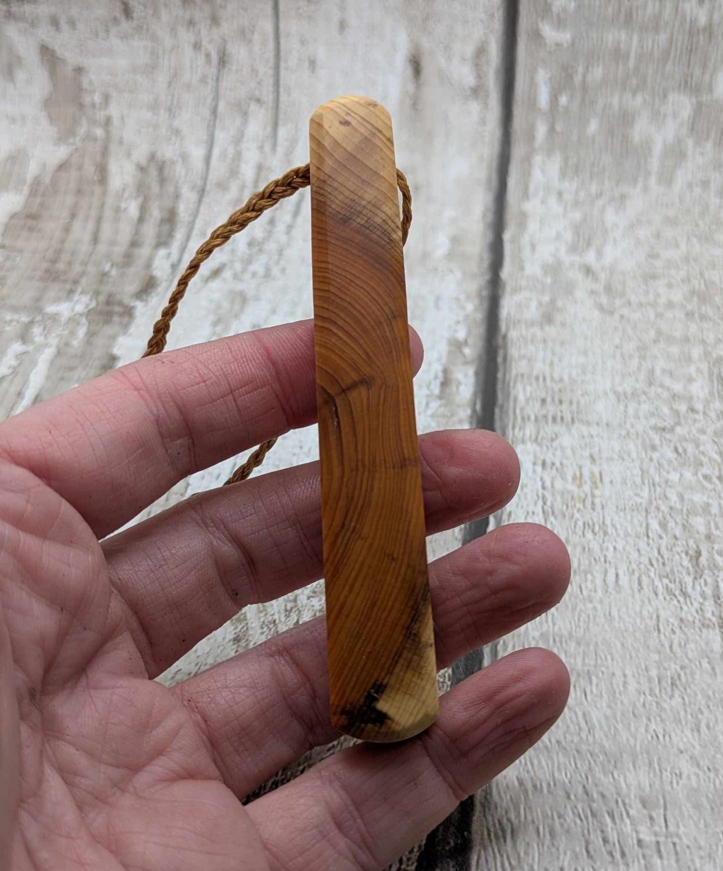 Yew wood roimata pendant.