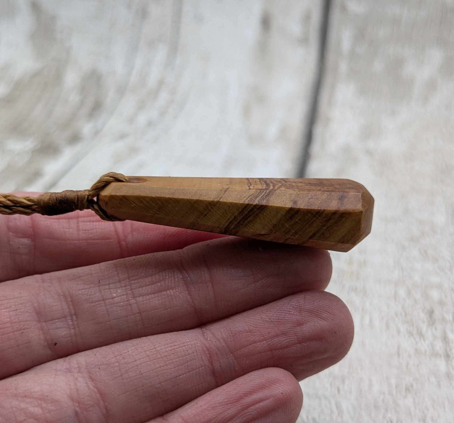 NZ Rimu wood roimata teardrop pendant.