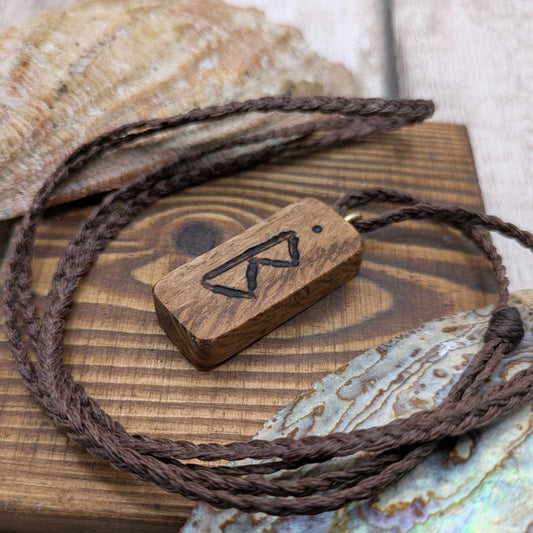 Olive wood berkana rune pendant.