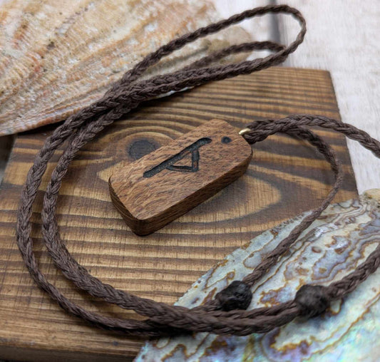 Olive wood thurisaz rune pendant.