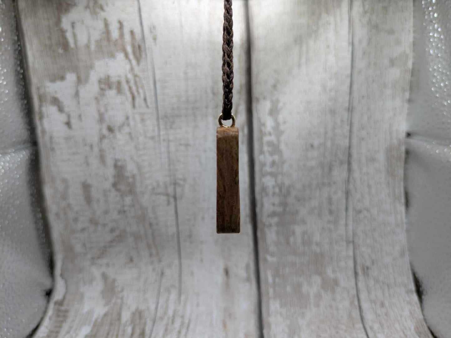 Olive wood berkana rune pendant.
