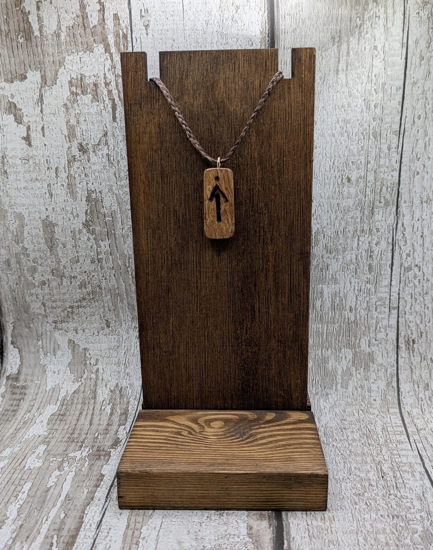 Olive wood tiwaz rune pendant.