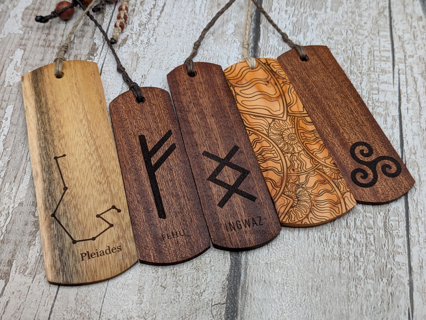 Laburnum wood hand made bookmark with Pleiades constellation laser print.