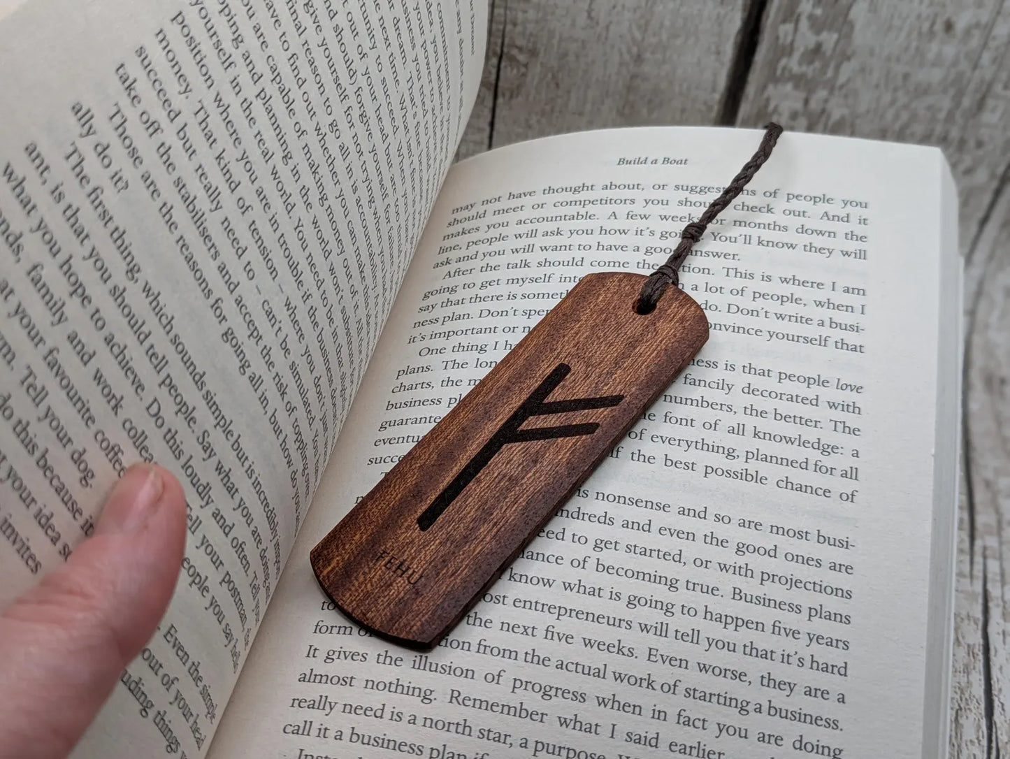Walnut wood handmade bookmark with fehu Norse rune laser print.