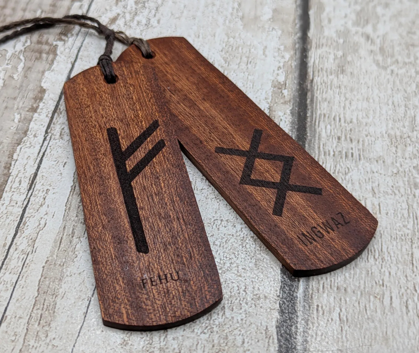 Walnut wood handmade bookmark with fehu Norse rune laser print.