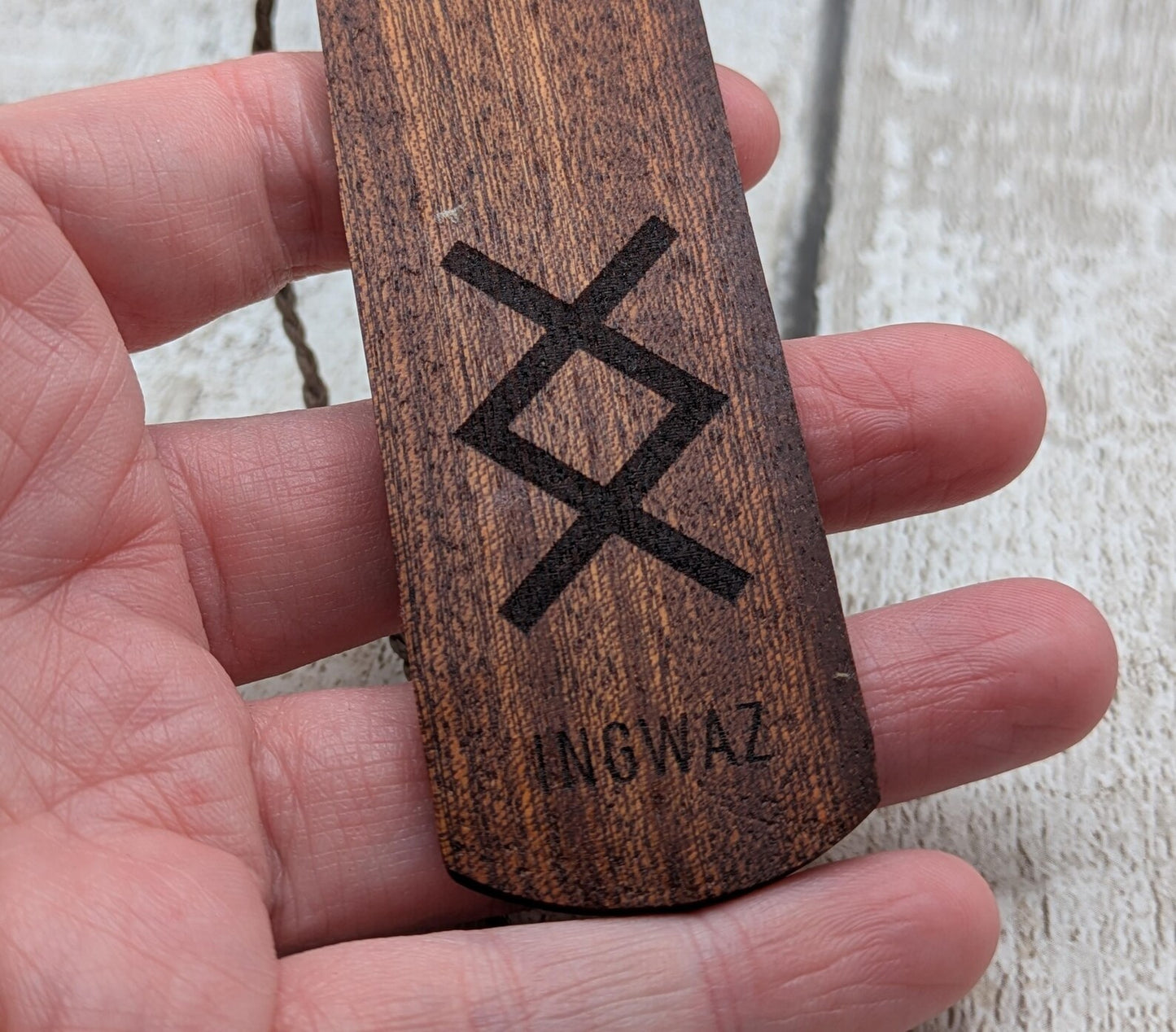 Walnut wood hand made bookmark with inhwaz rune laser print.