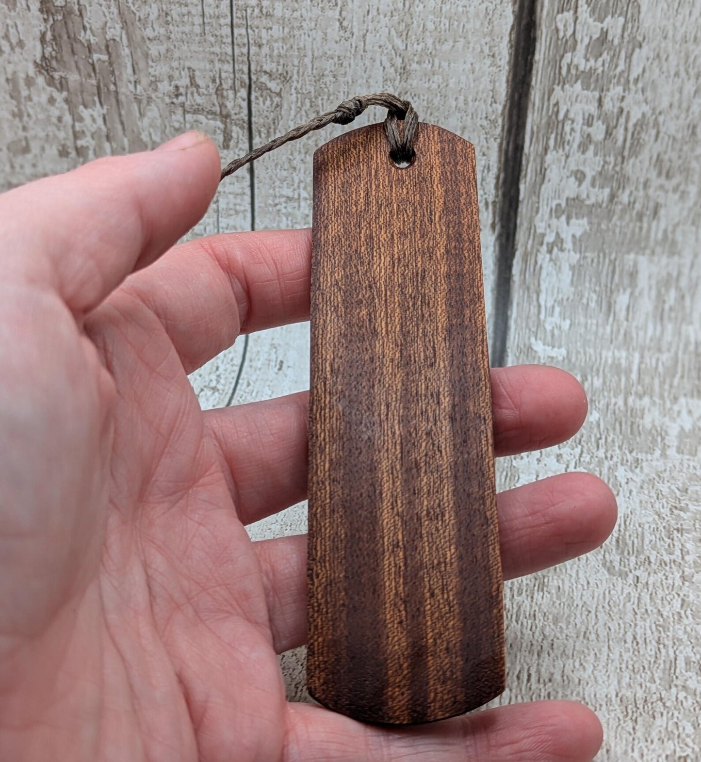 Walnut wood hand made bookmark with inhwaz rune laser print.
