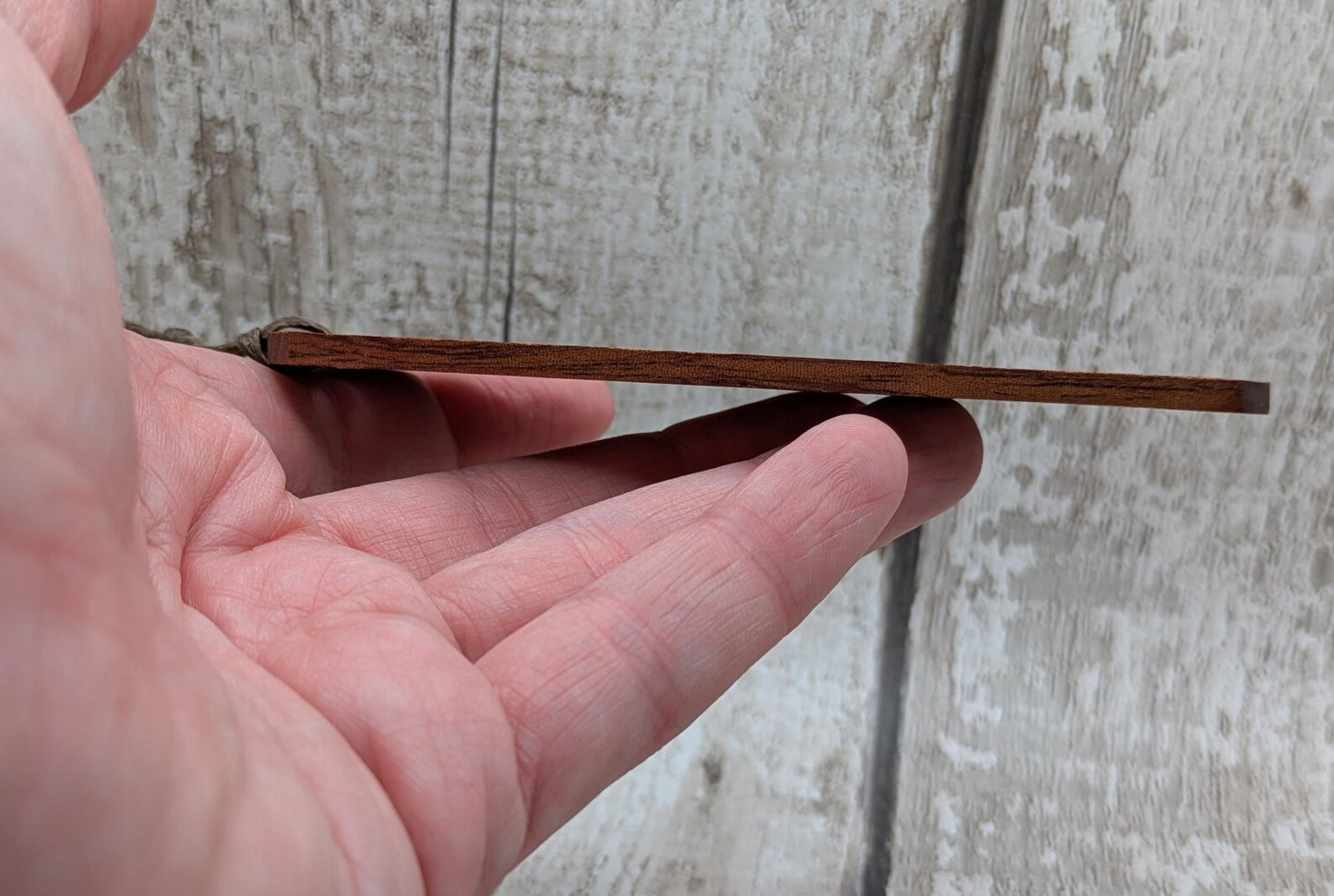 Walnut wood hand made bookmark with inhwaz rune laser print.