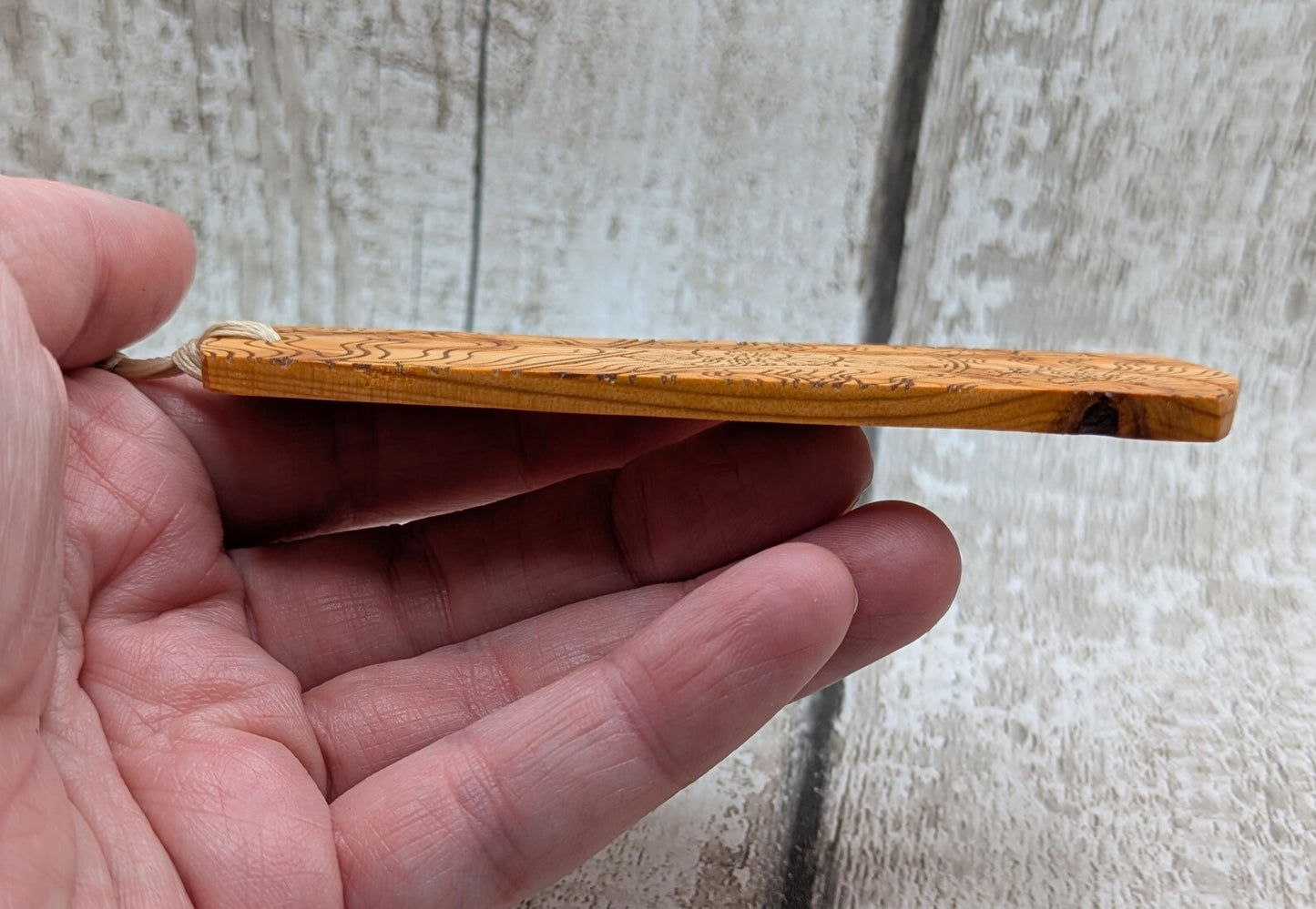 Yew wood handmade bookmark with ammonite laser print image.