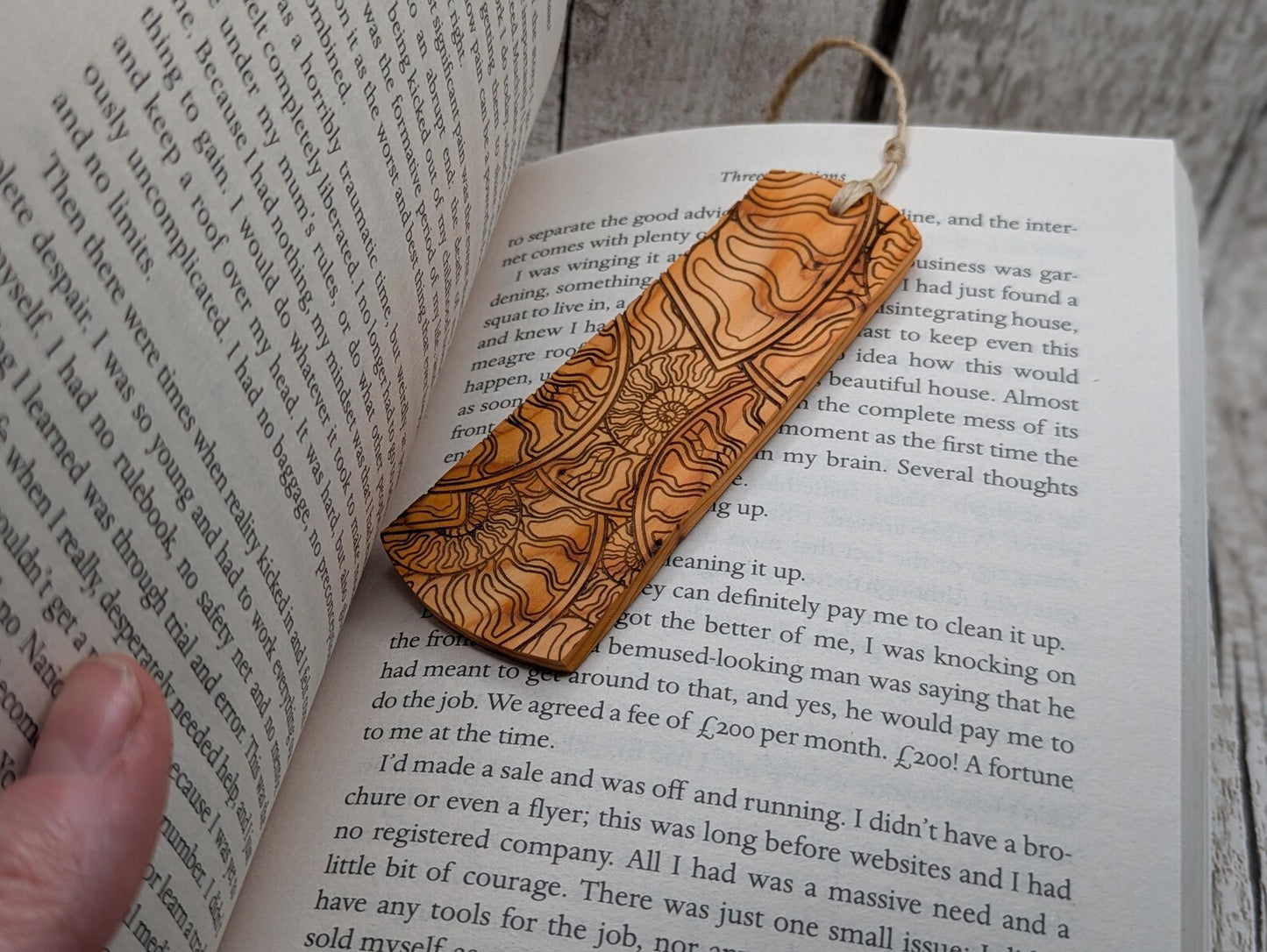 Yew wood handmade bookmark with ammonite laser print image.