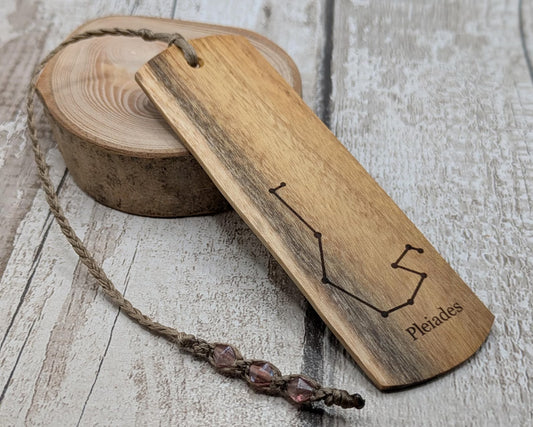 Laburnum wood hand made bookmark with Pleiades constellation laser print.