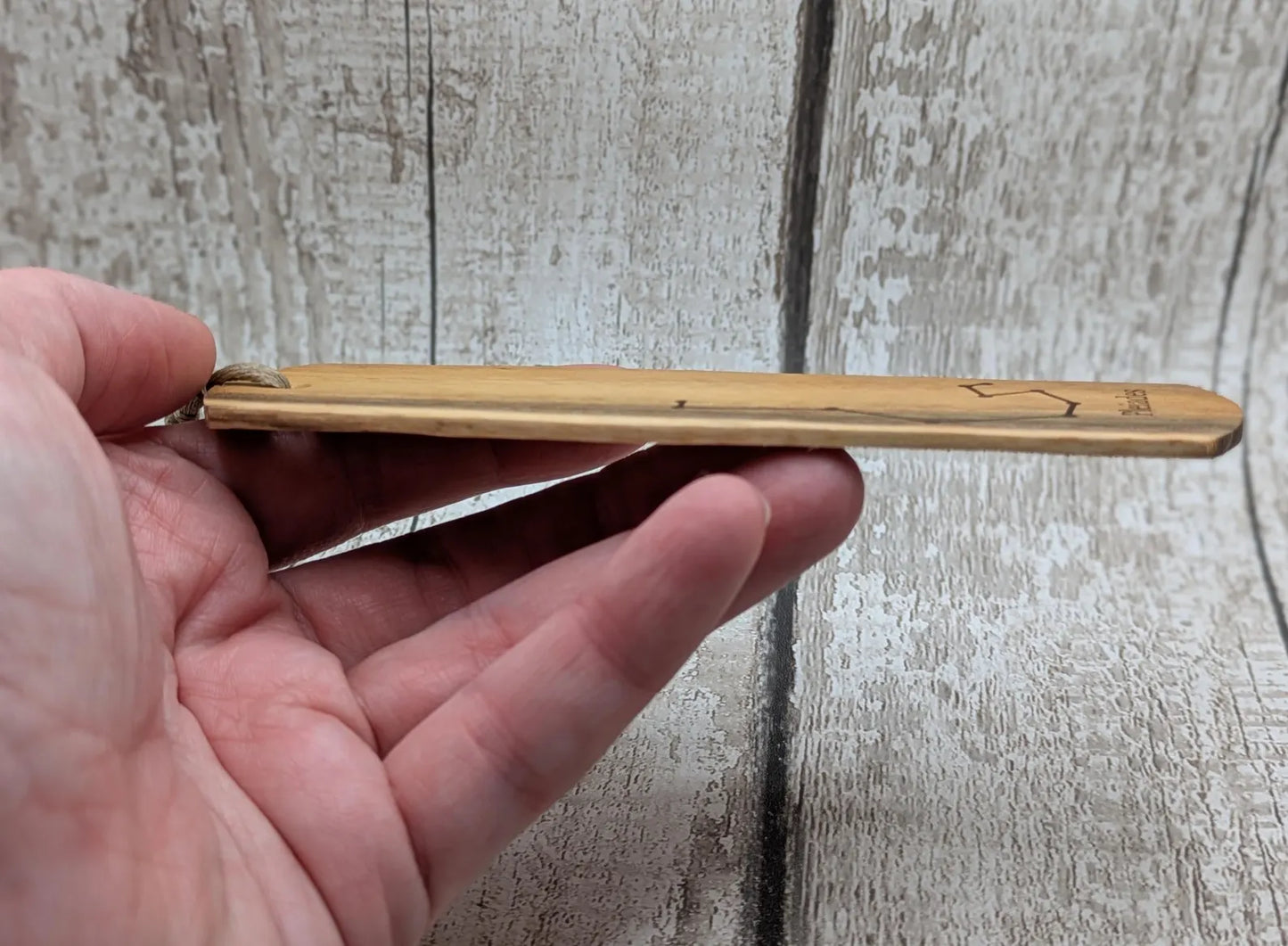 Laburnum wood hand made bookmark with Pleiades constellation laser print.