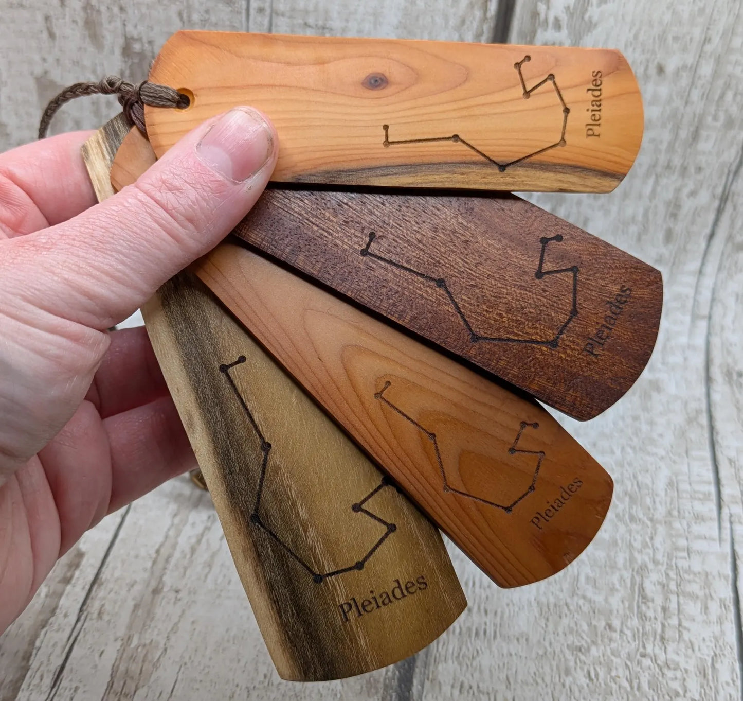 Walnut wood hand made bookmark with laser printed Pleiades constellation.
