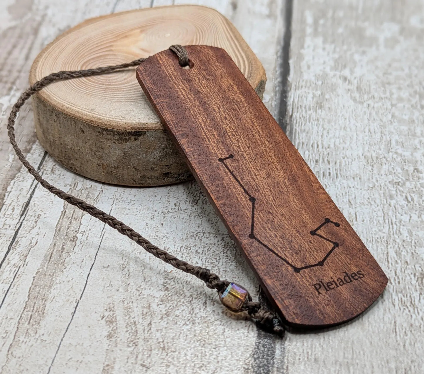 Walnut wood hand made bookmark with laser printed Pleiades constellation.