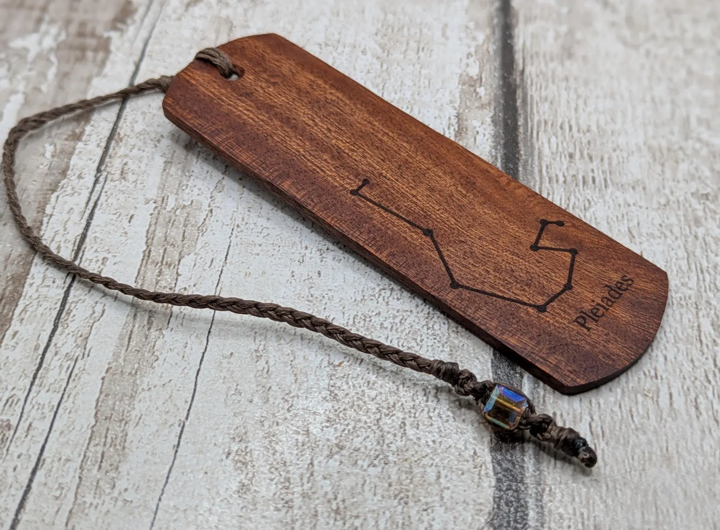 Walnut wood hand made bookmark with laser printed Pleiades constellation.