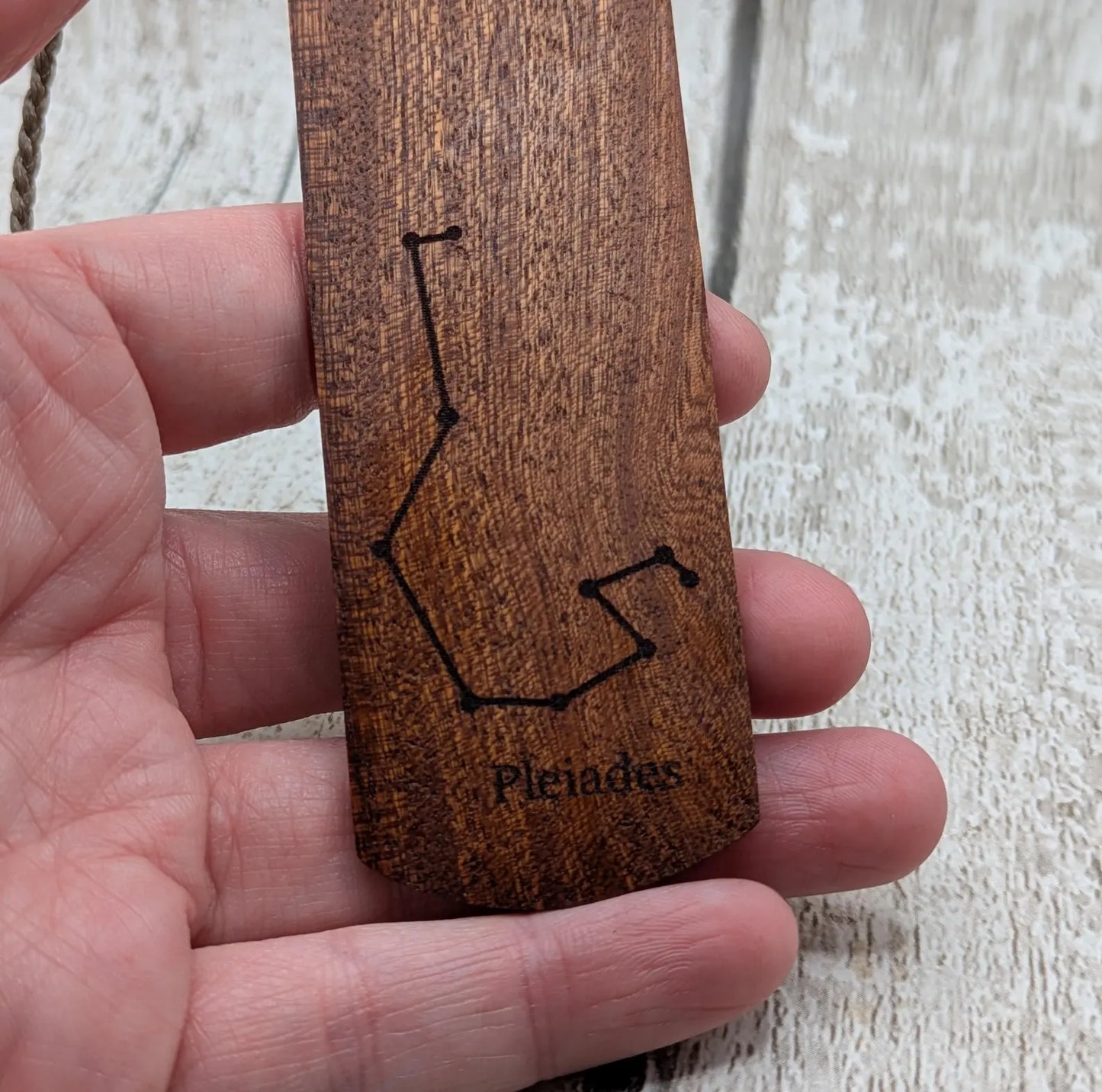 Walnut wood hand made bookmark with laser printed Pleiades constellation.