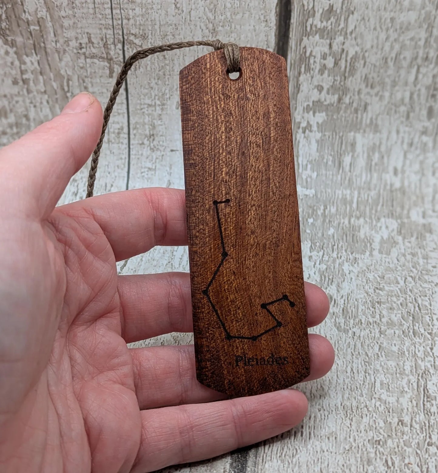 Walnut wood hand made bookmark with laser printed Pleiades constellation.
