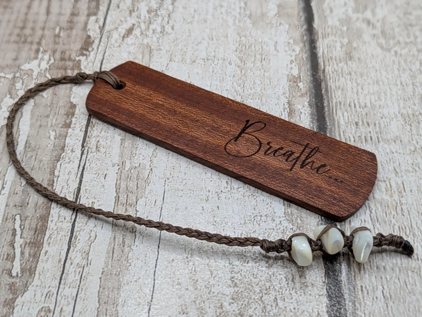 Walnut wood hand made bookmark with breathe laser printed mantra.