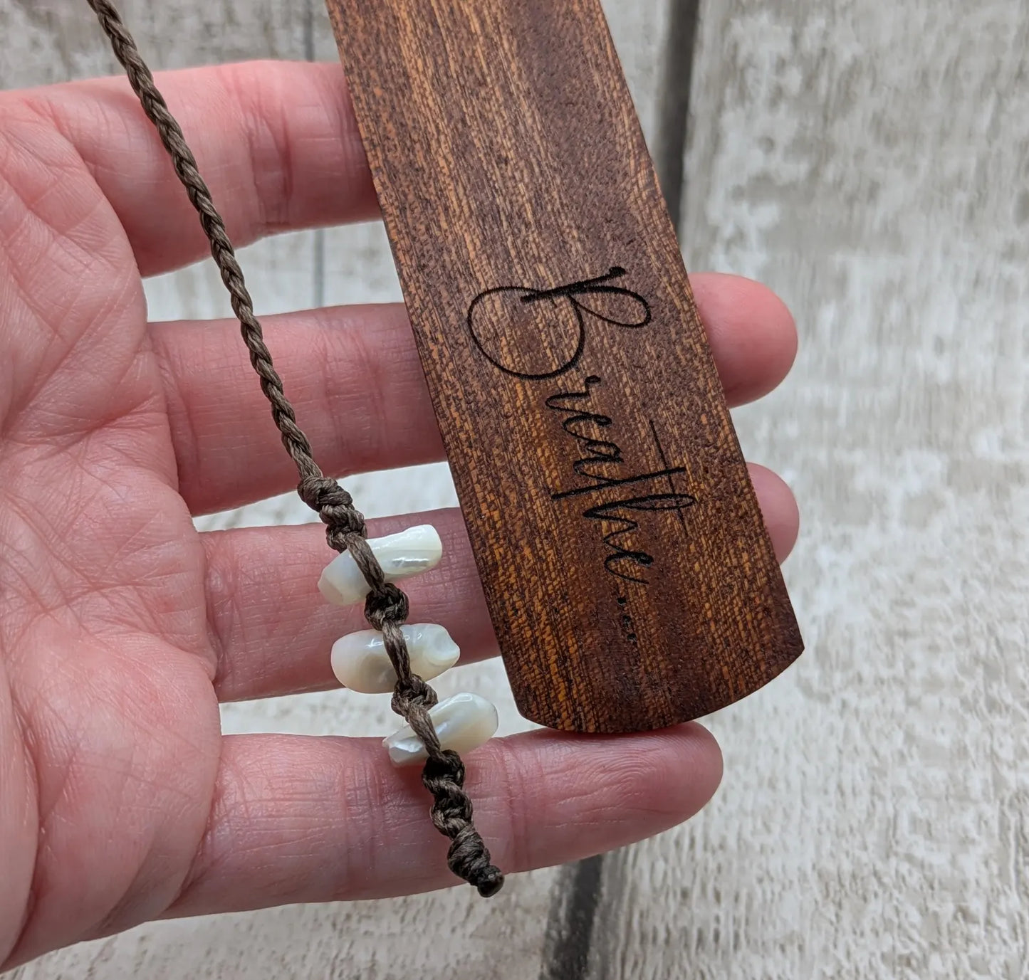 Walnut wood hand made bookmark with breathe laser printed mantra.