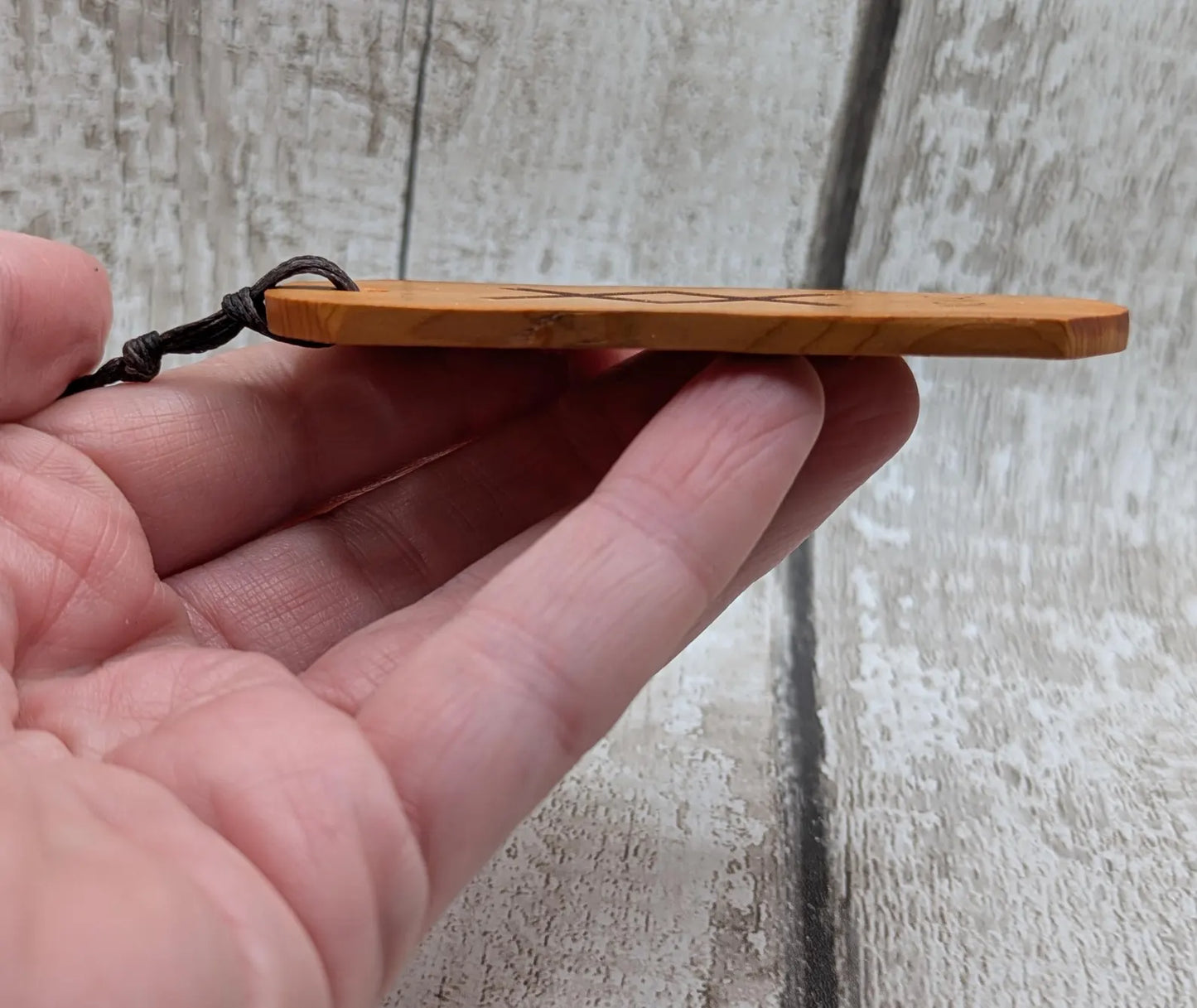 Inhwaz Norse rune laser printed on yew wood hand made bookmark.