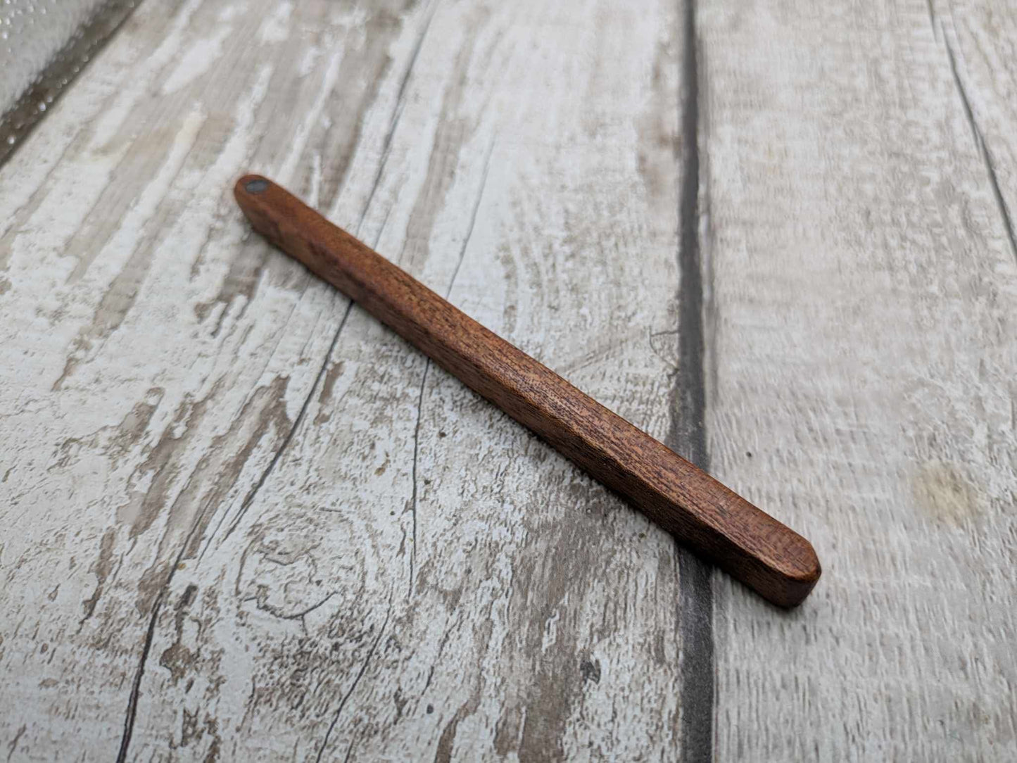 Sepele mahogany wood with blue kyanite inlay.