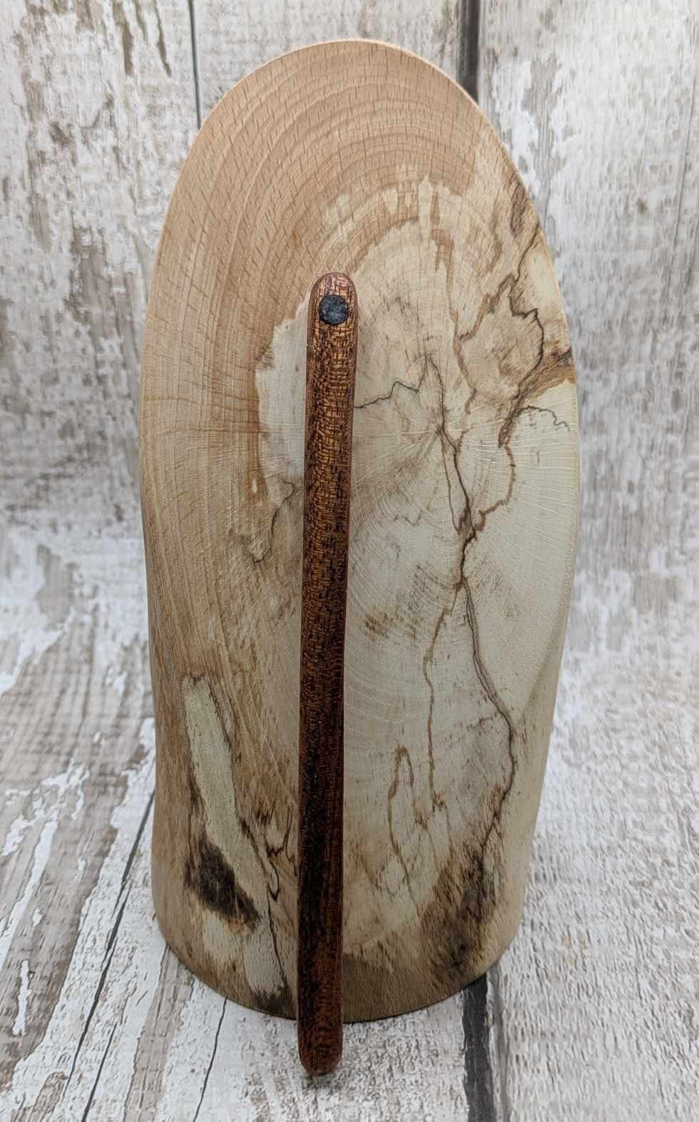 Sepele mahogany wood with blue kyanite inlay.