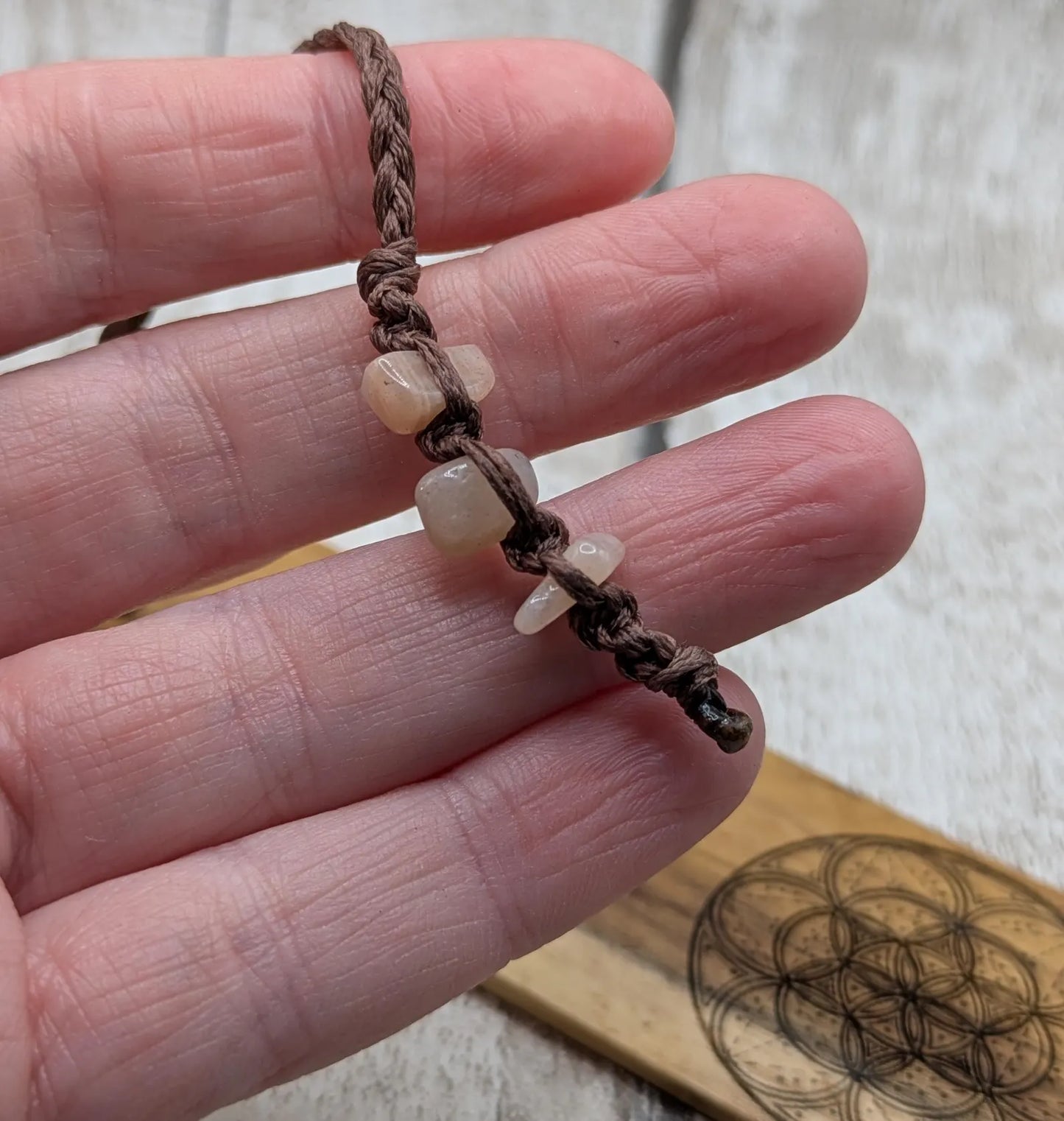 Laburnum wood hand made bookmark with geometric laser pattern.