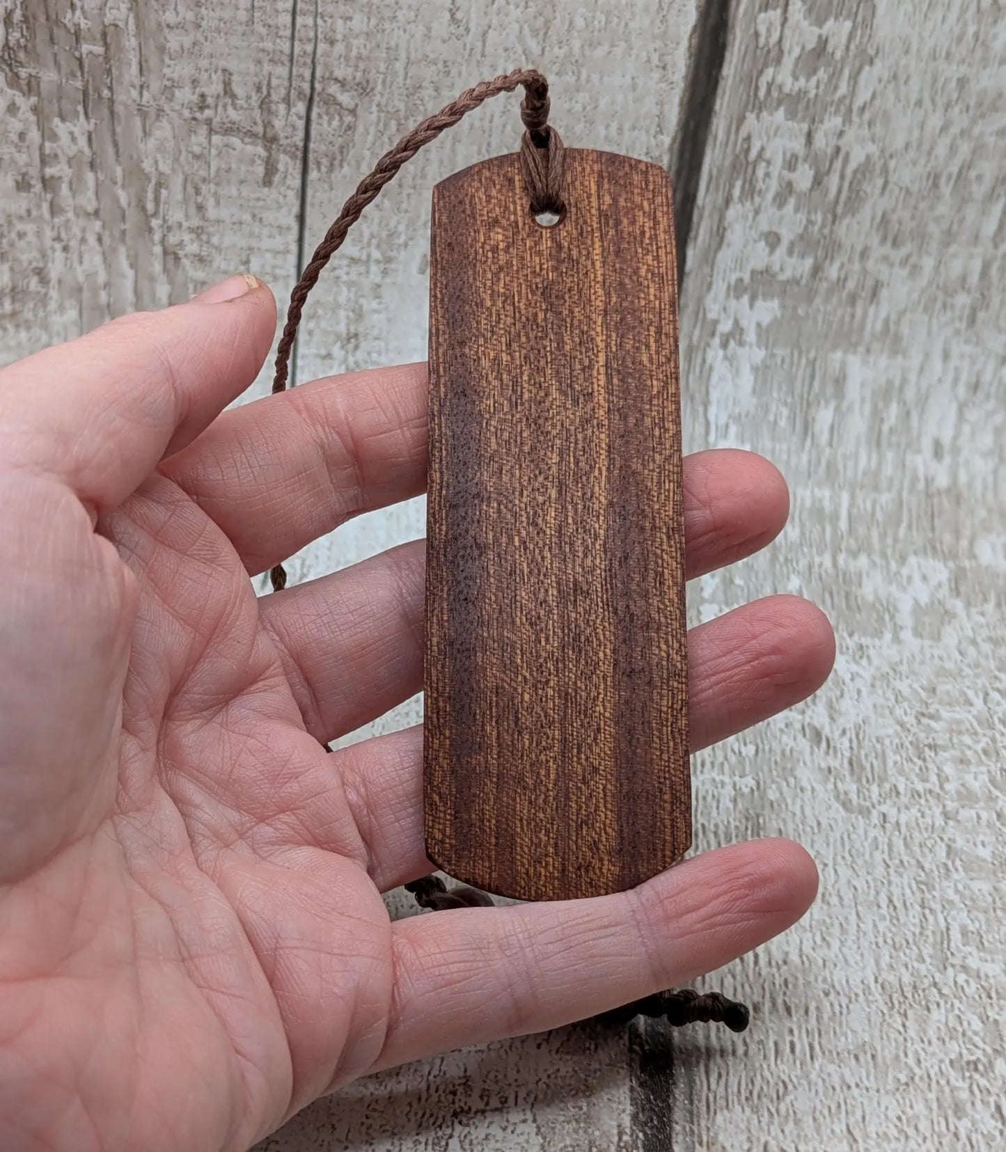 Walnut wood hand made bookmark with laser printed bumble bee design.
