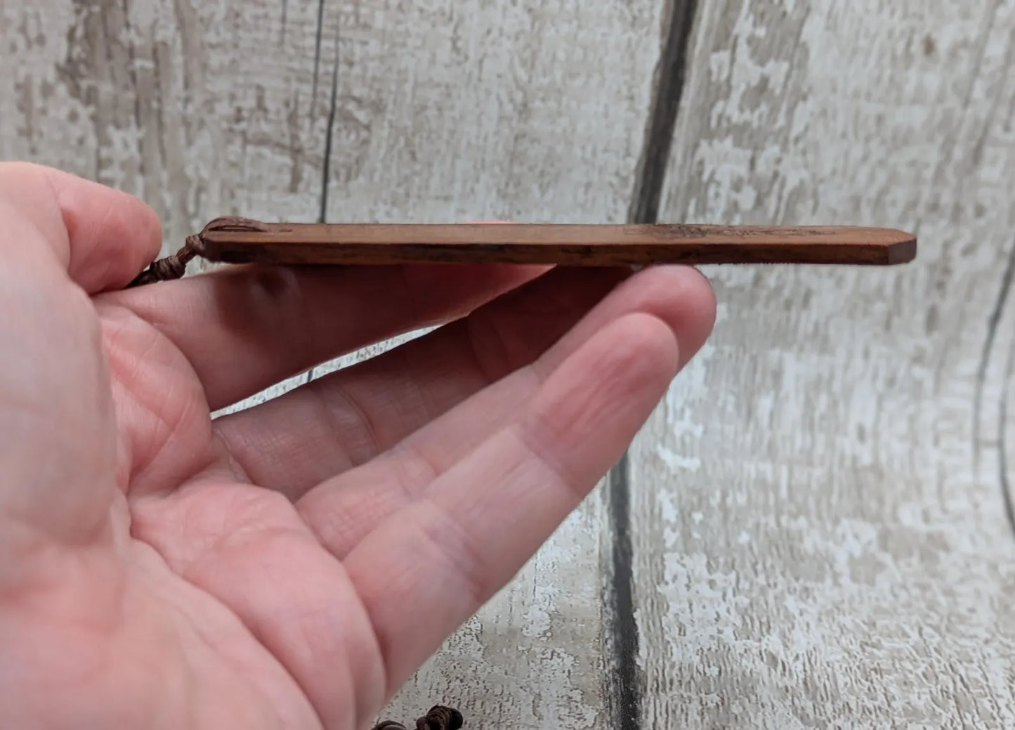 Walnut wood hand made bookmark with laser printed bumble bee design.