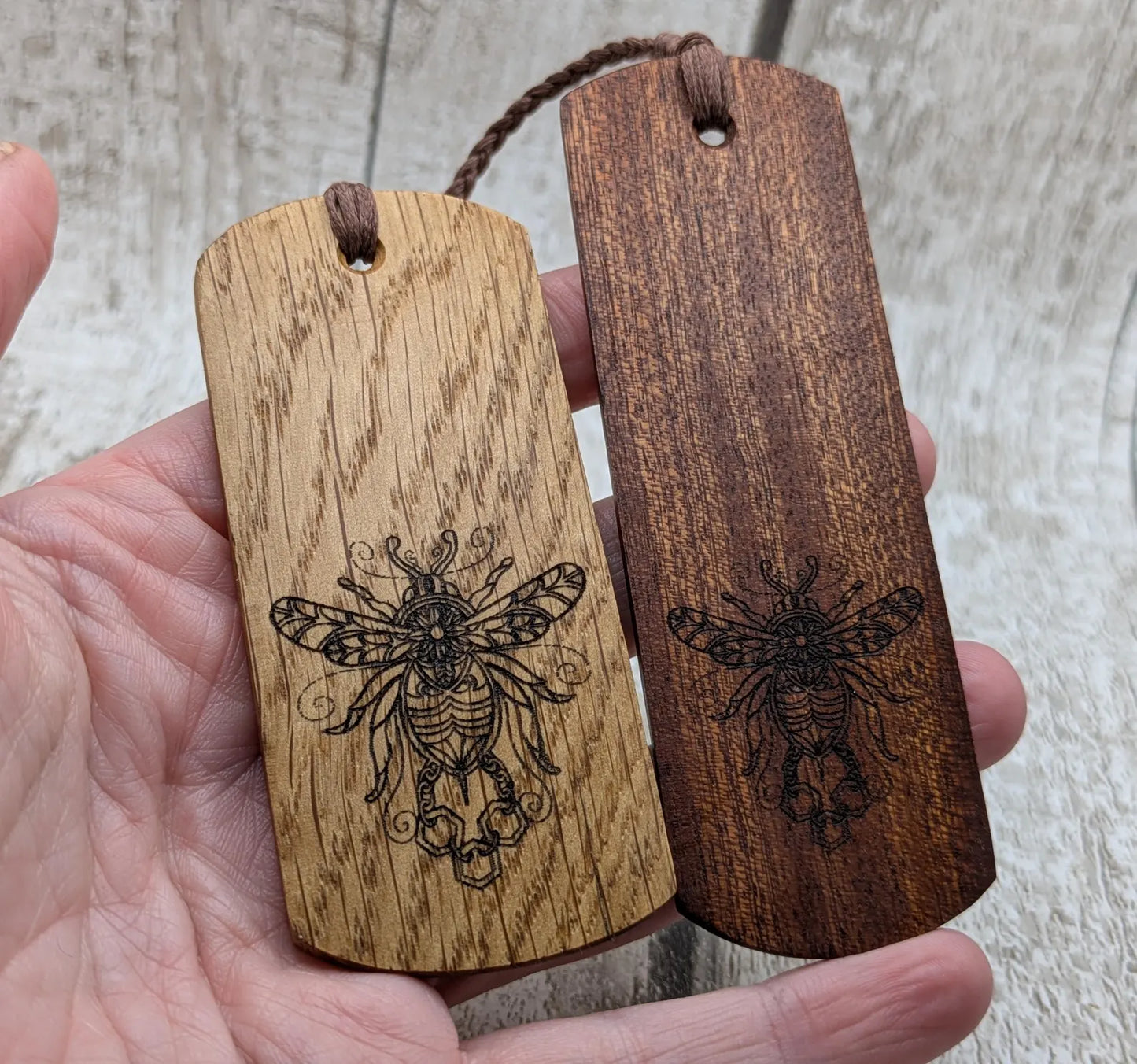 Walnut wood hand made bookmark with laser printed bumble bee design.