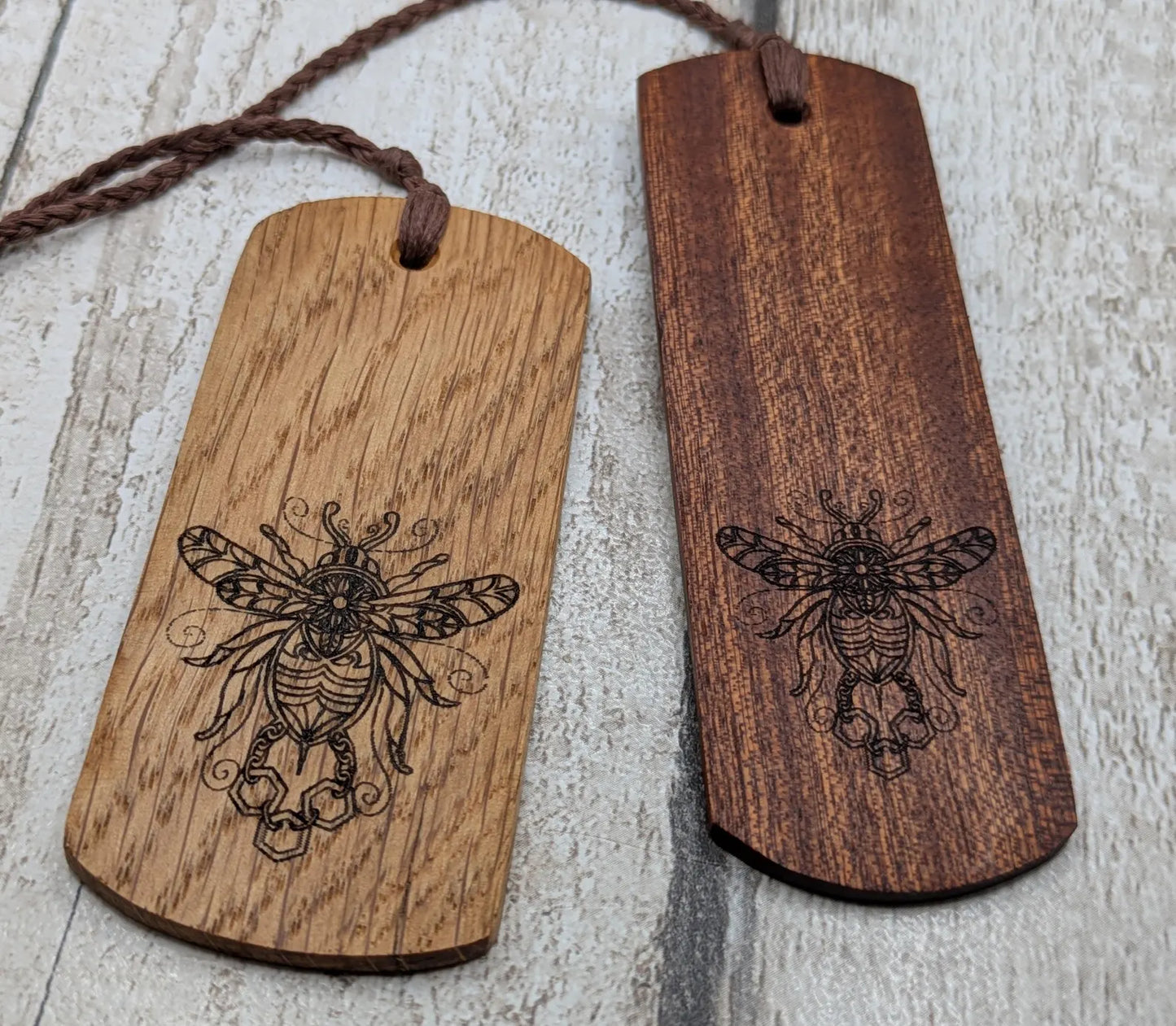 Walnut wood hand made bookmark with laser printed bumble bee design.