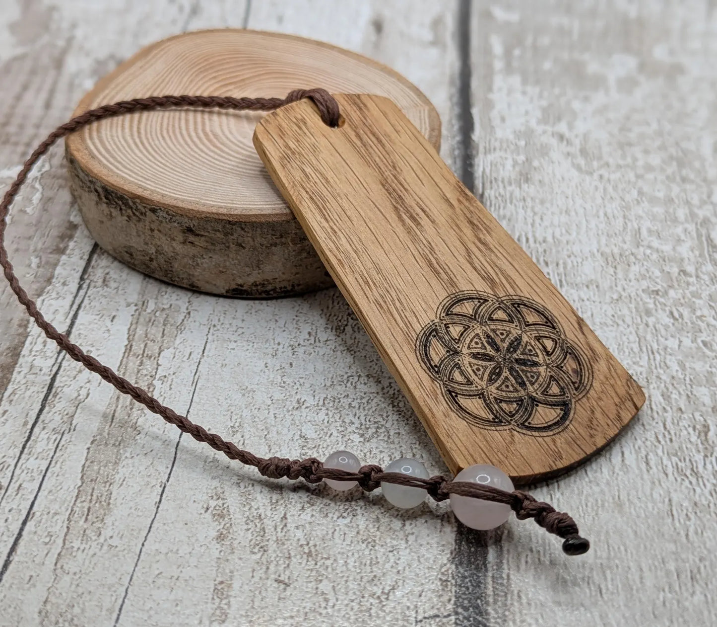 Oak wood hand made bookmark with a geometric laser print.