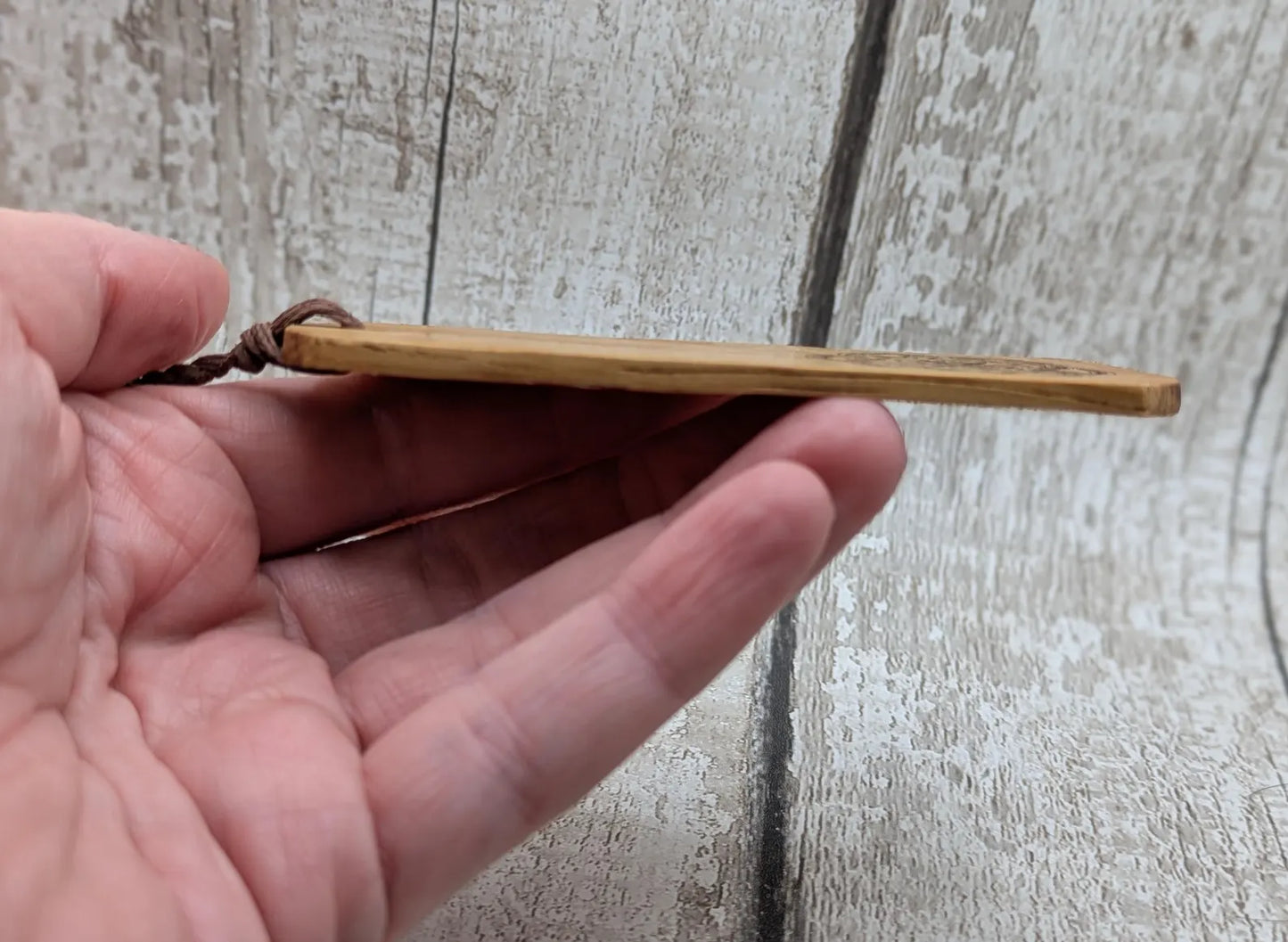 Oak wood hand made bookmark with a geometric laser print.