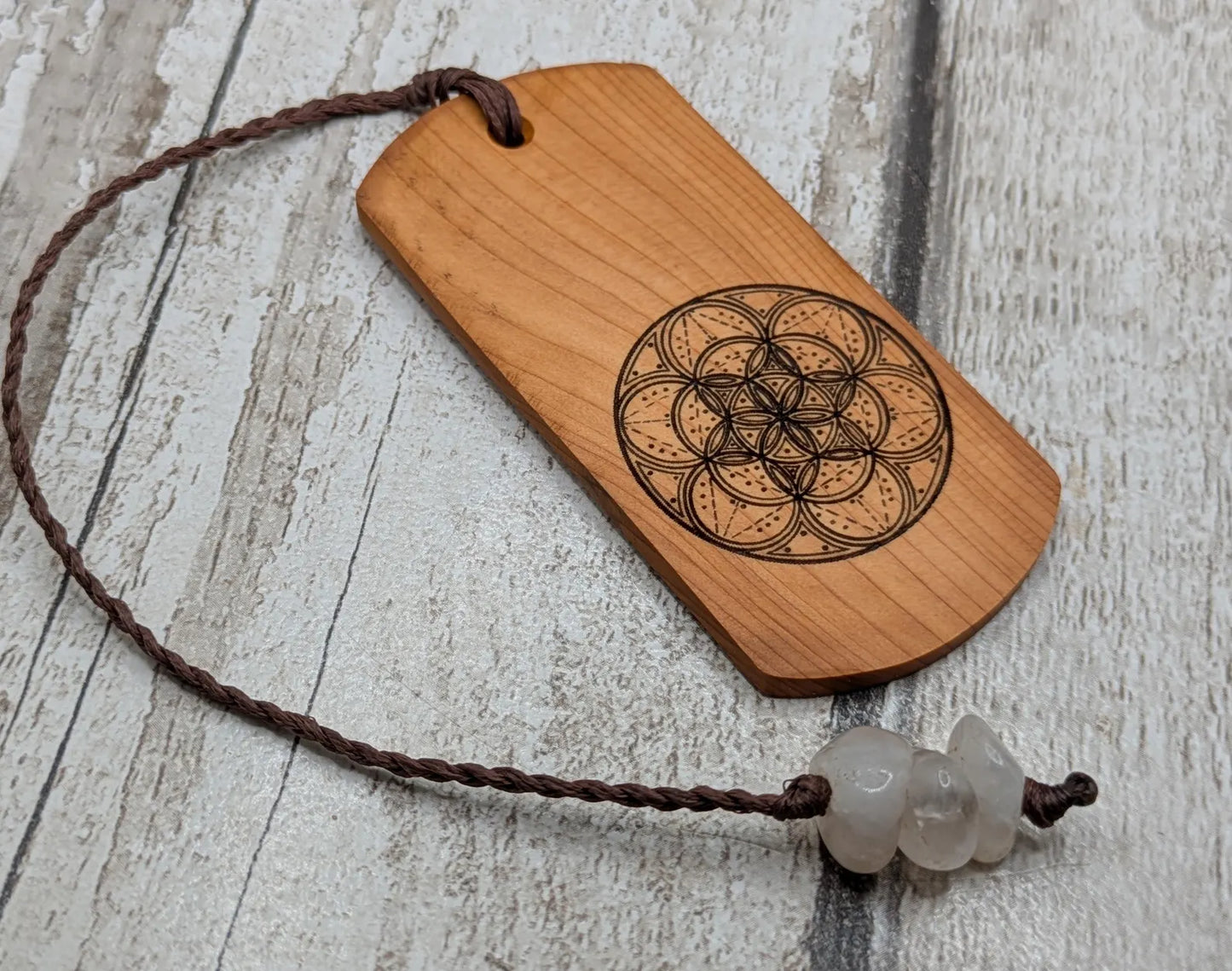 Yew wood handmade bookmark with geometric laser print.