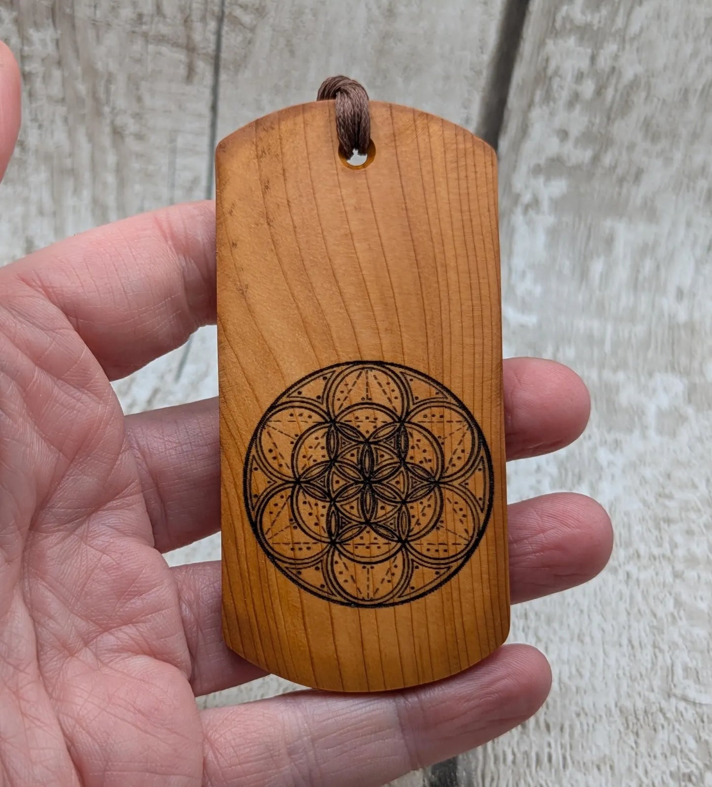 Yew wood handmade bookmark with geometric laser print.