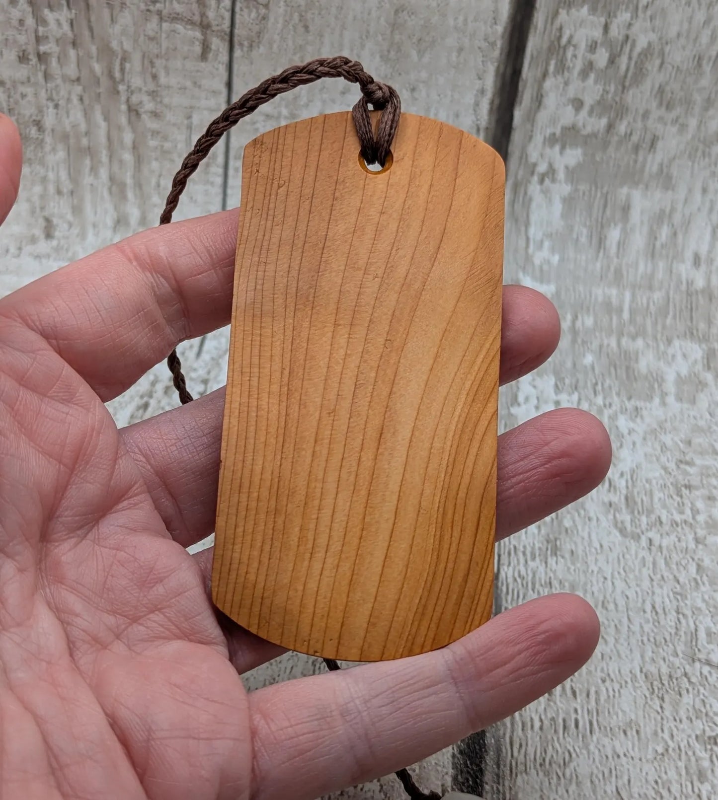 Yew wood handmade bookmark with geometric laser print.