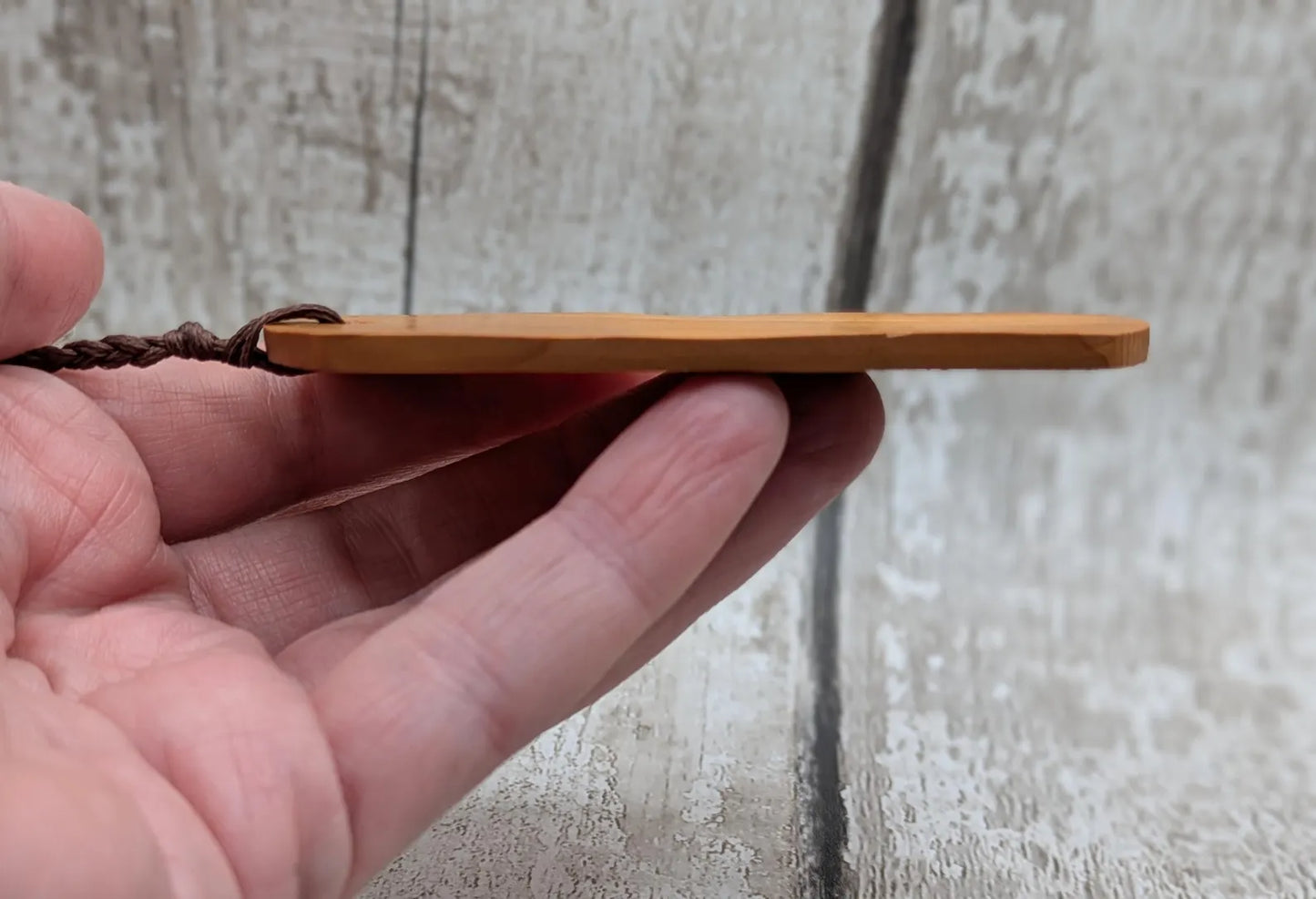 Yew wood handmade bookmark with geometric laser print.