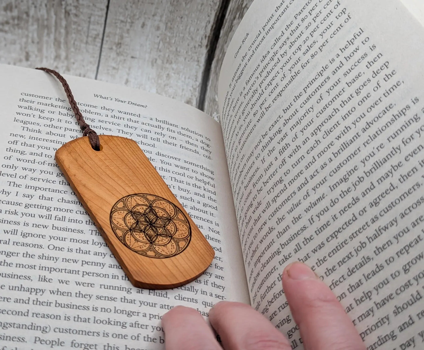 Yew wood handmade bookmark with geometric laser print.