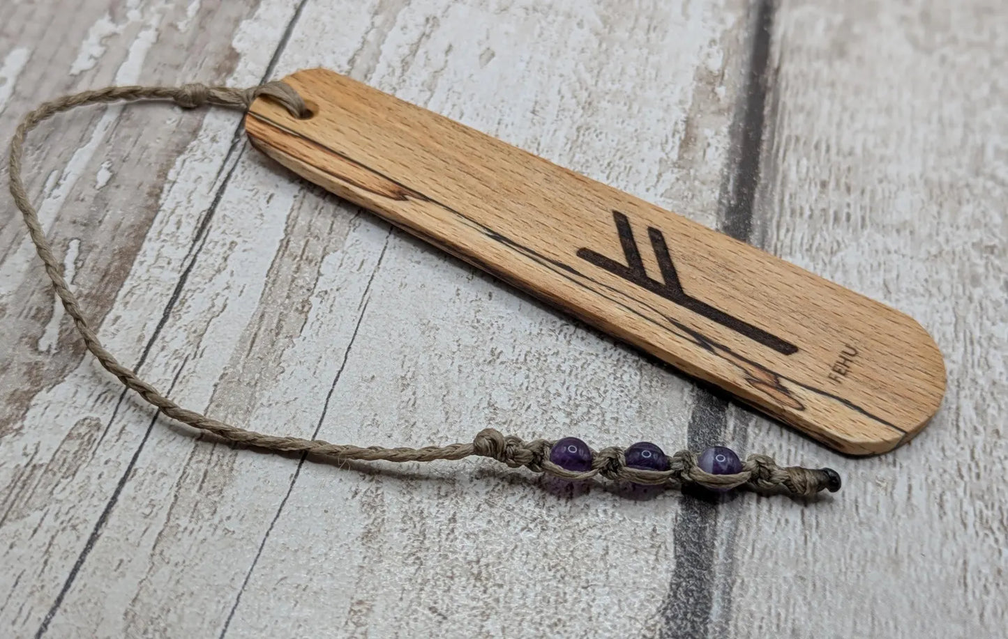 Spalted beech wood handmade fehu rune bookmark.