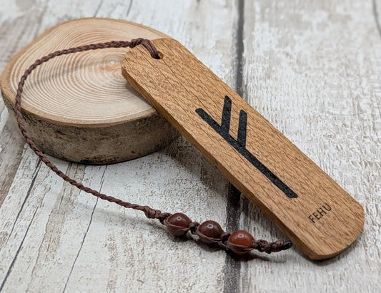 Handmade oak wood fehu rune bookmark.