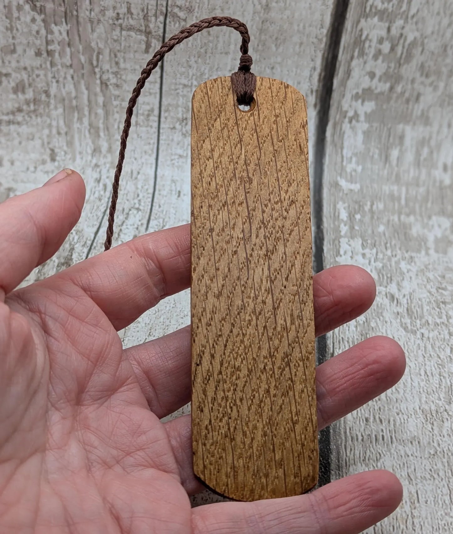 Handmade oak wood fehu rune bookmark.