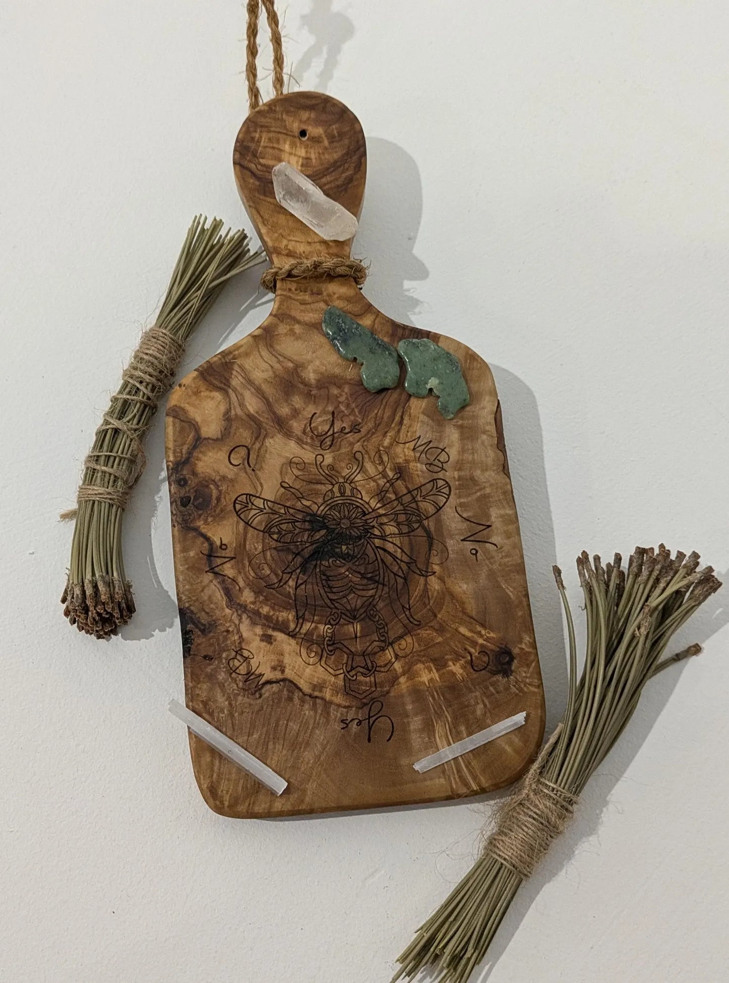 Olive wood bumble bee pendulum dowsing board with incense stick holder.
