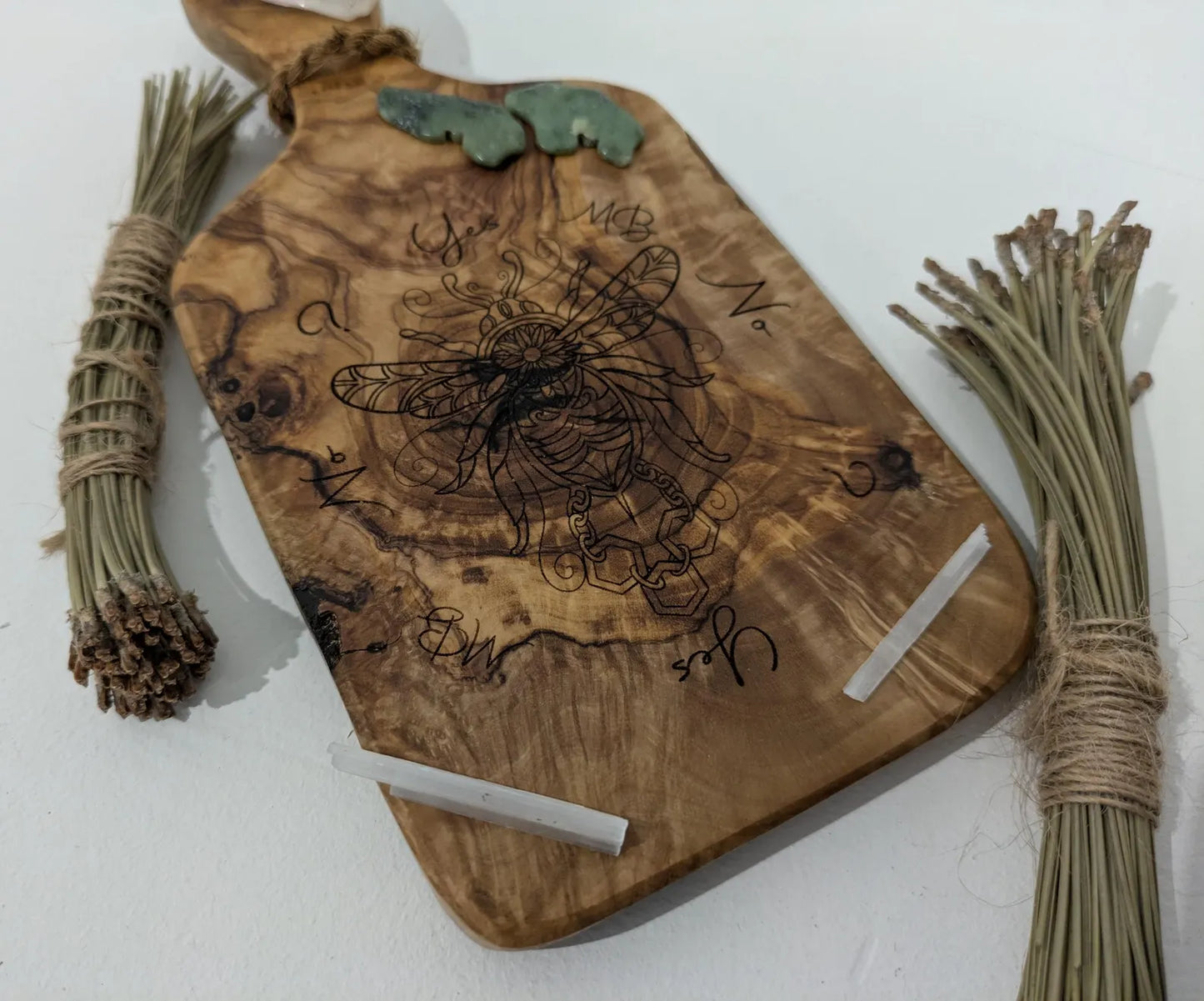 Olive wood bumble bee pendulum dowsing board with incense stick holder.