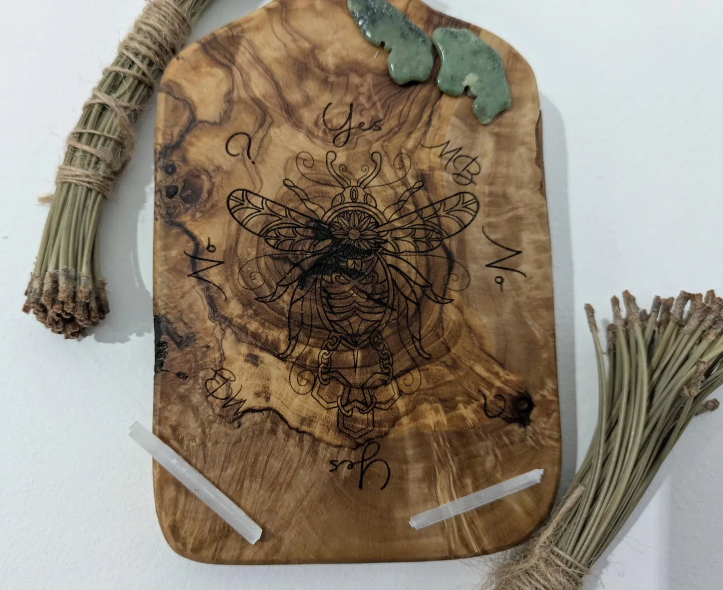 Olive wood bumble bee pendulum dowsing board with incense stick holder.