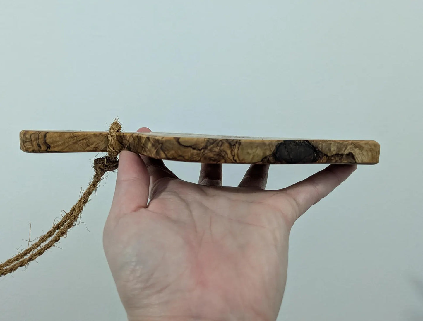 Olive wood bumble bee pendulum dowsing board with incense stick holder.