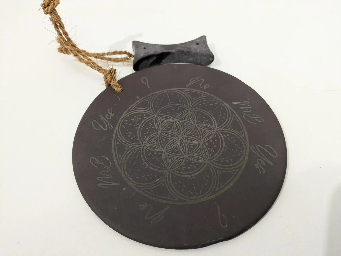 Welsh slate geometric print pendulum dowsing board with incense holder.