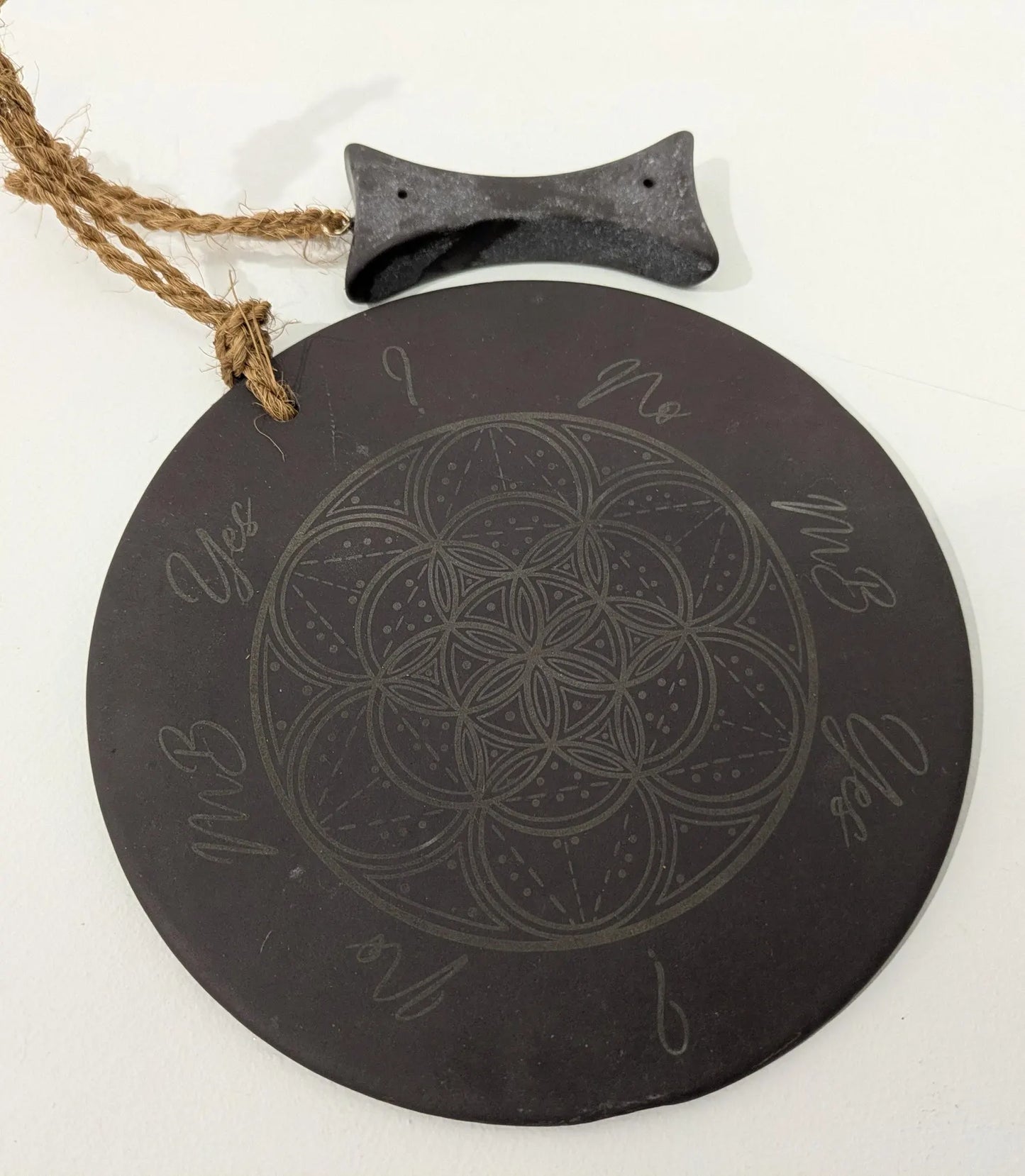 Welsh slate geometric print pendulum dowsing board with incense holder.