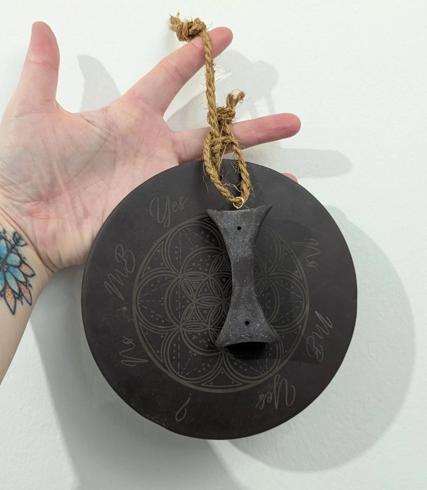 Welsh slate geometric print pendulum dowsing board with incense holder.