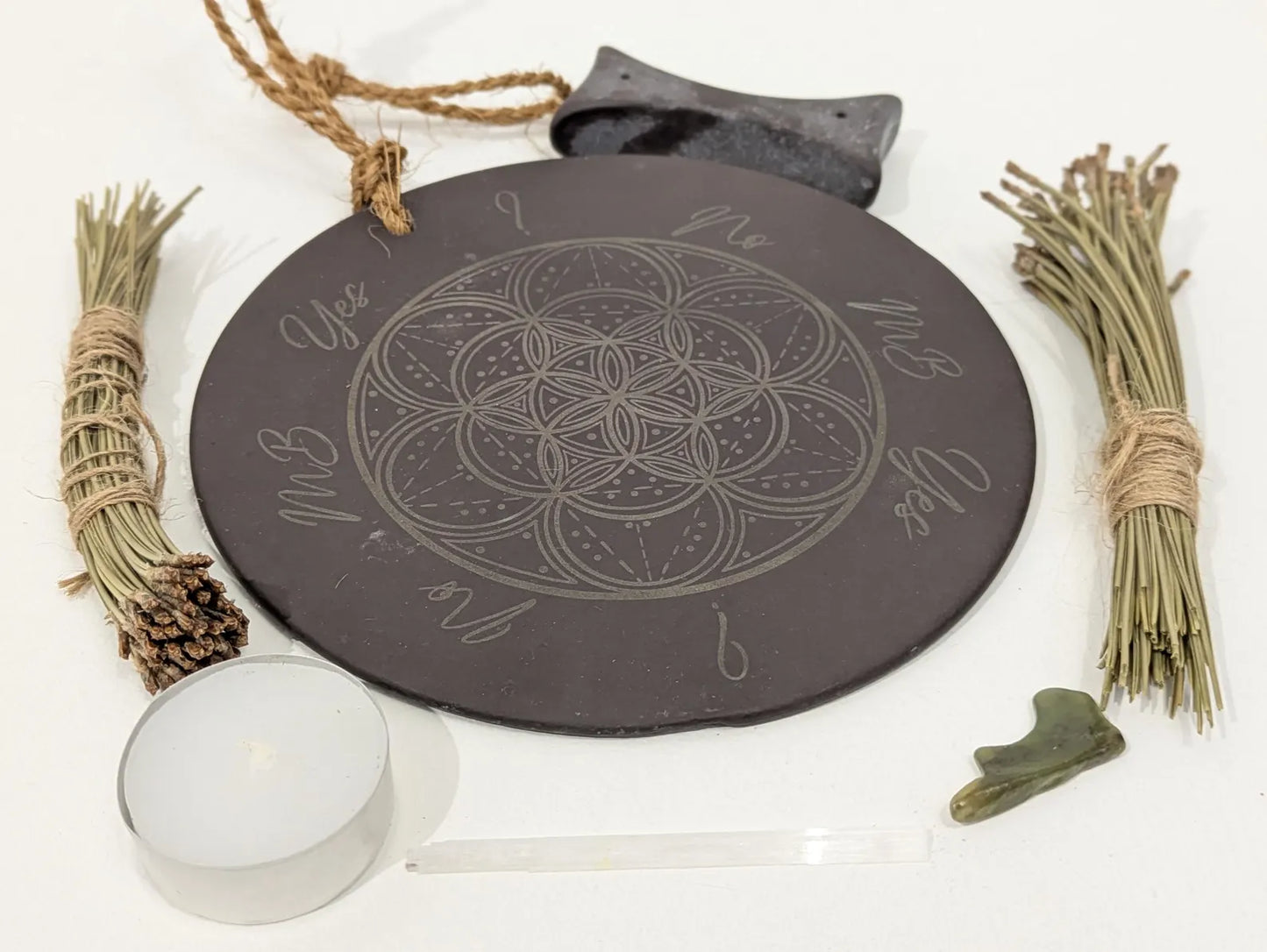 Welsh slate geometric print pendulum dowsing board with incense holder.